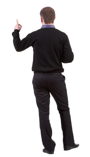 ビジネスの男を指しているの背面図. — ストック写真