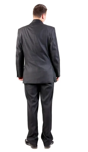 Vista de homem de negócios em terno preto vendo traseira. — Fotografia de Stock