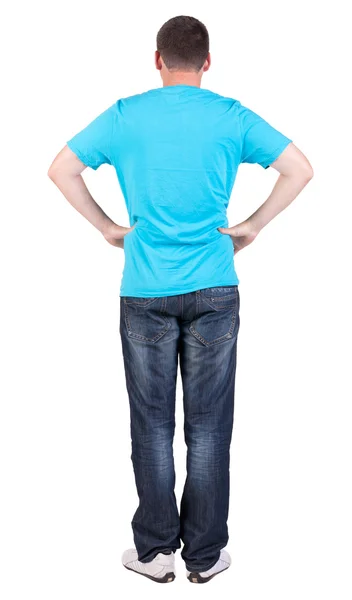 Вернуться мнение молодых людей в голубой футболке и джинсах. — стоковое фото