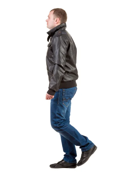 Back view of going man in jacket. — Stock Photo, Image