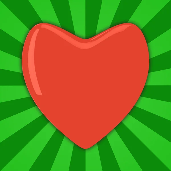 Červené srdce na zeleni — Stock fotografie