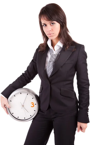 Mulher de negócios segurando um relógio — Fotografia de Stock