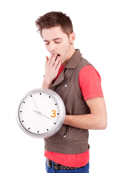 Young man holding a clock — Stock Photo, Image