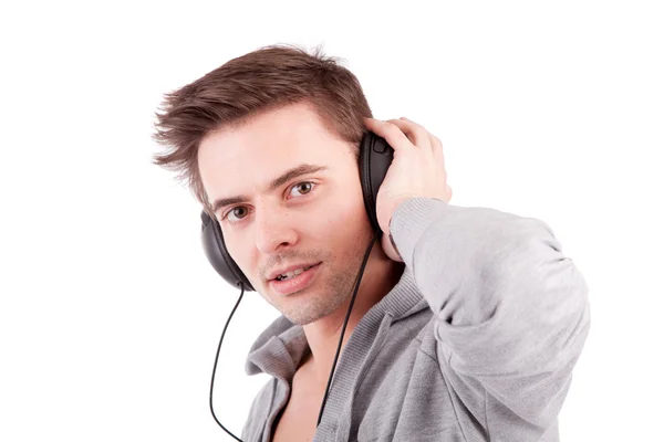 Młody człowiek słuchający muzyki — Zdjęcie stockowe