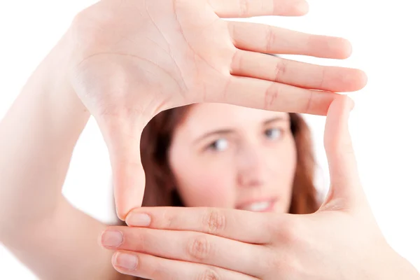 Жінка показує жест рук у рамці — стокове фото