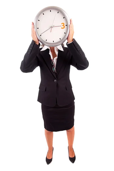 Mulher de negócios segurando um relógio — Fotografia de Stock
