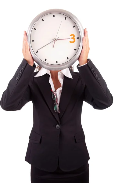 Femme d'affaires tenant une horloge — Photo