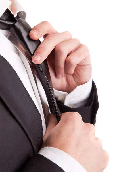 Business man fixing his tie — Stock Photo, Image