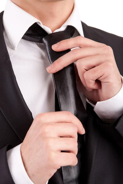 Business man fixing his tie — Stock Photo, Image
