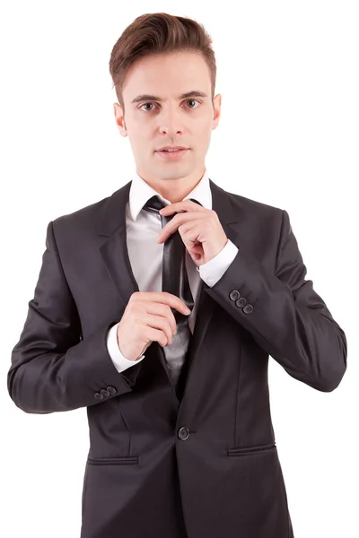 Hombre de negocios arreglando su corbata —  Fotos de Stock