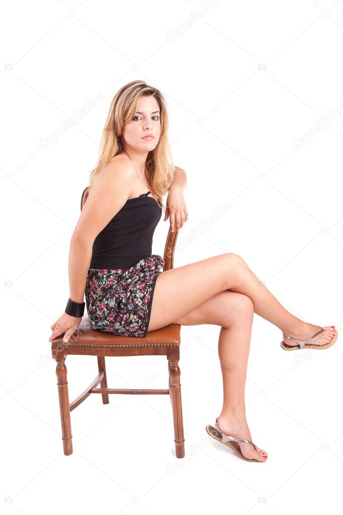 Beautiful woman sitting on a chair Stock Photo by ©hsfelix 11230471