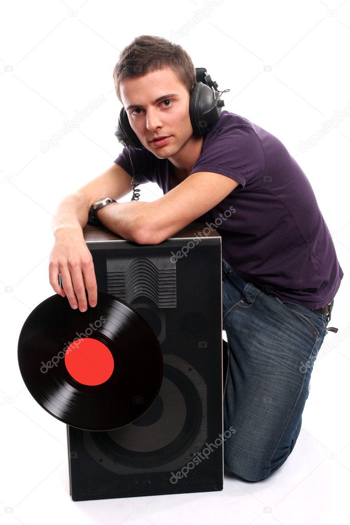 Dj in headphones holding a plate