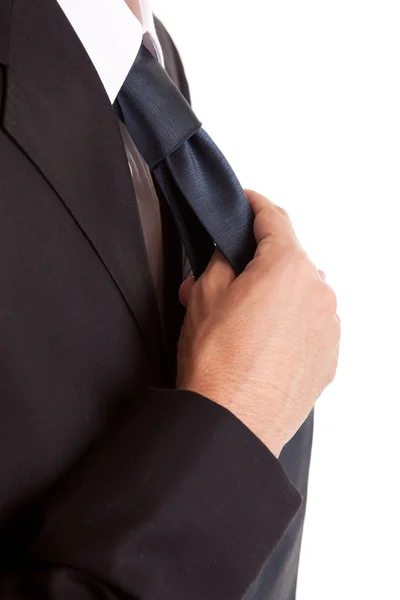 Zakenman repareert zijn stropdas — Stockfoto