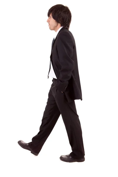 Young business man walking — Stock Photo, Image