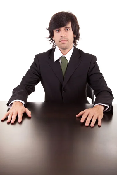 Affärsman som poserar på kontor — Stockfoto