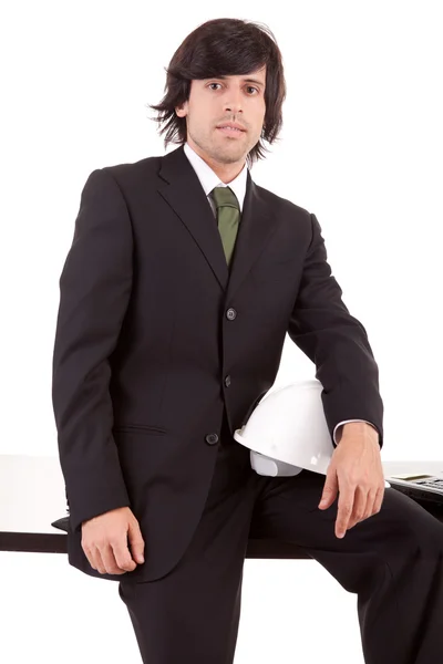 Affärsman som poserar på kontor — Stockfoto