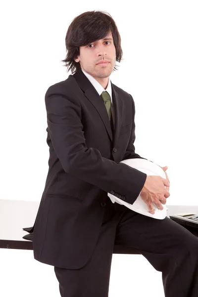 Obchodní muž pózuje v kanceláři — Stock fotografie
