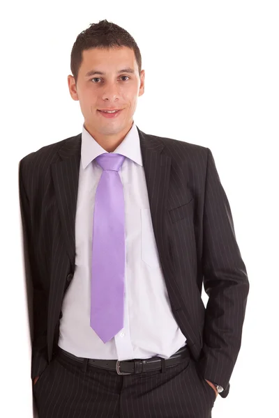 Business man leaning against wall — Stock Photo, Image