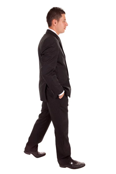 Young business man walking — Stock Photo, Image