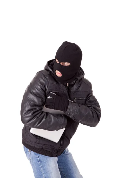 Ladrón sosteniendo un portátil —  Fotos de Stock