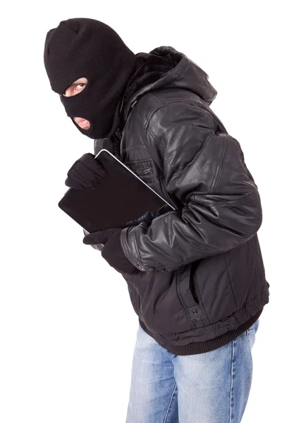 Ladrón sosteniendo un portátil —  Fotos de Stock