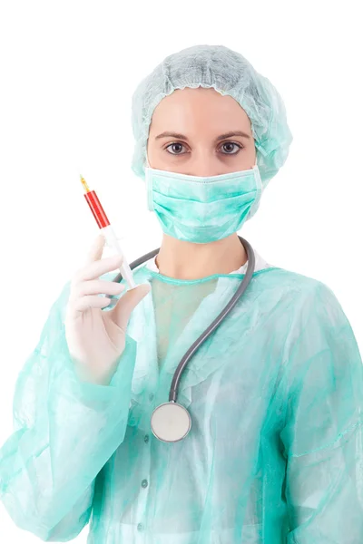 Infirmière tenant une seringue — Photo