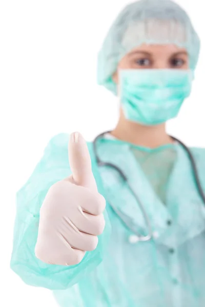 Jovem enfermeira mostrando polegares para cima — Fotografia de Stock