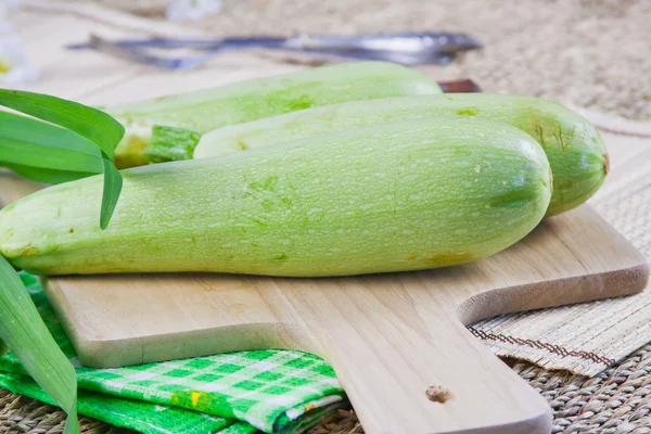 stock image Vegetable marrows on a wooden board