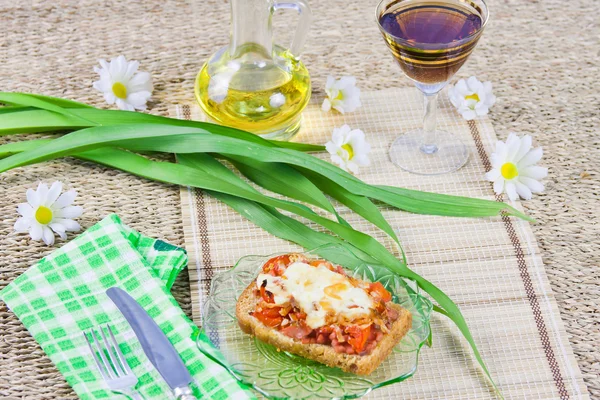 stock image Hot open sandwich with sausage and vegetables