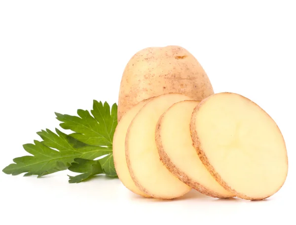 Kartoffelknollen und Petersilienblätter — Stockfoto