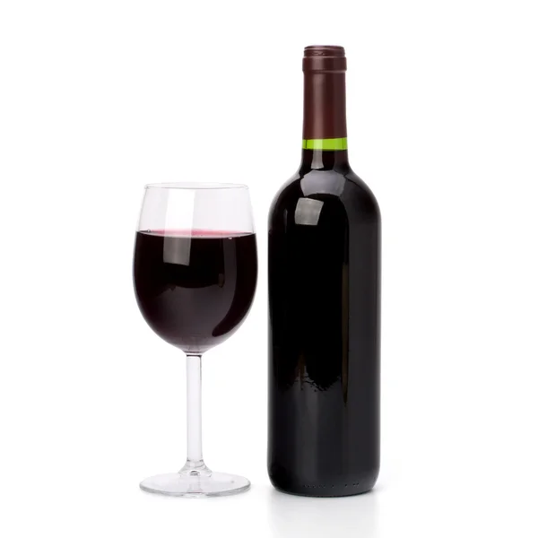 Full red wine glass goblet and bottle — Stock Photo, Image