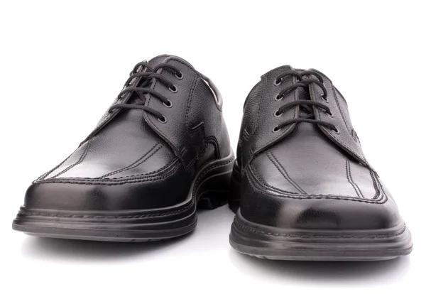 Black glossy mans shoes with shoelaces — Stock Photo, Image