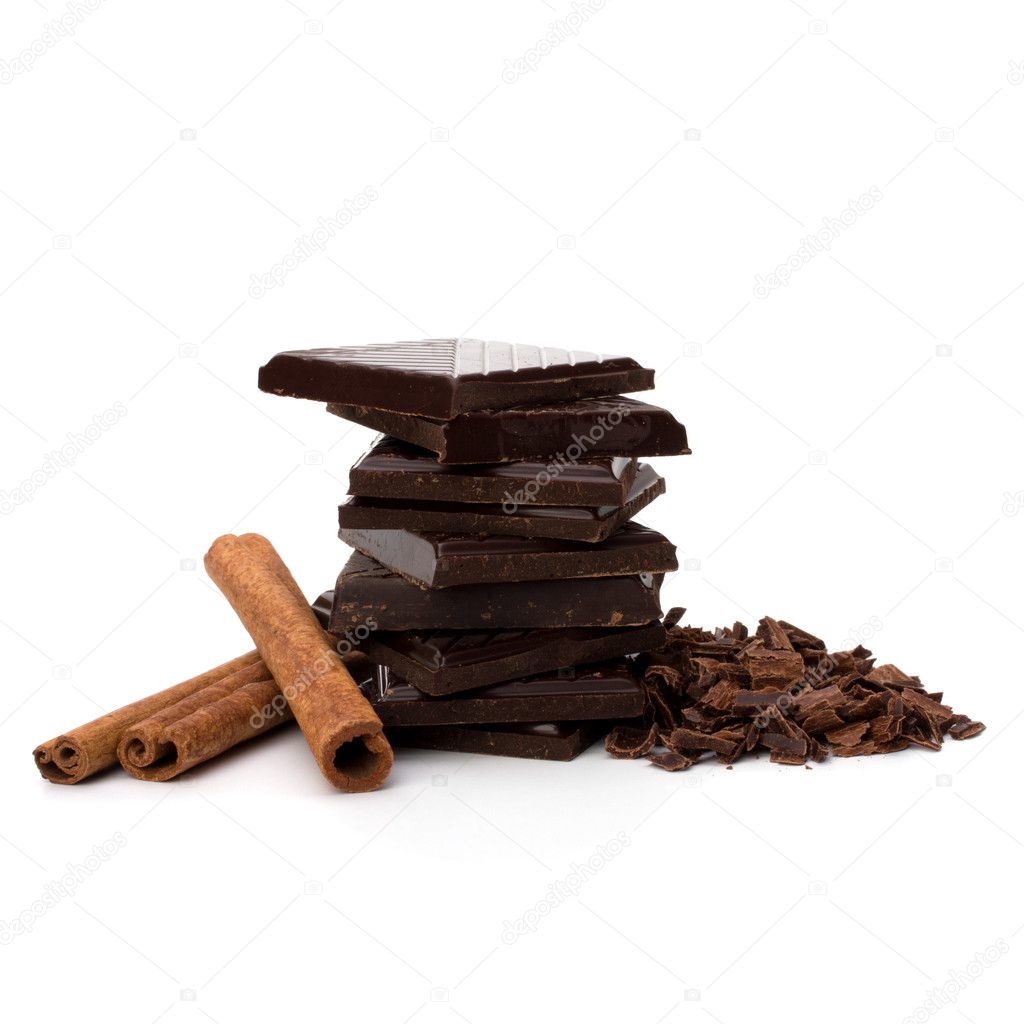 Chocolate bars stack and cinnamon sticks
