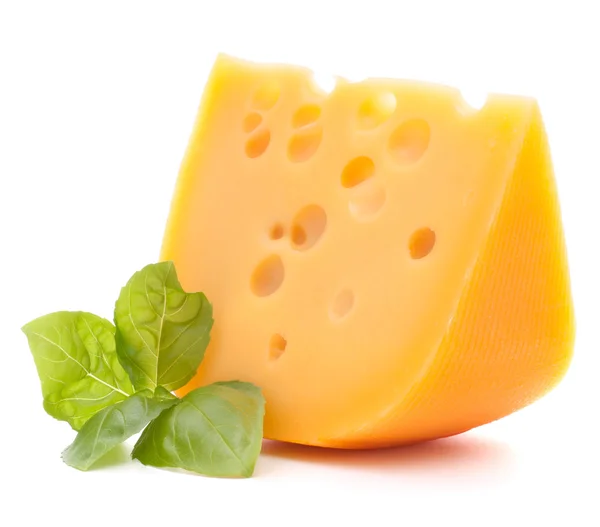 Cheese and basil leaves — Stock Photo, Image