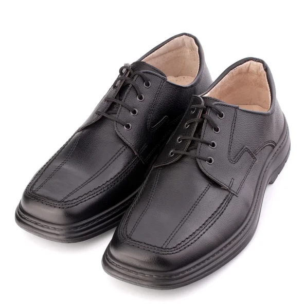 Черные ботинки с сапогами — стоковое фото