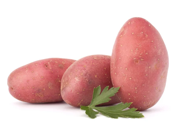Nieuwe aardappel Knol heap en peterselie bladeren — Stockfoto