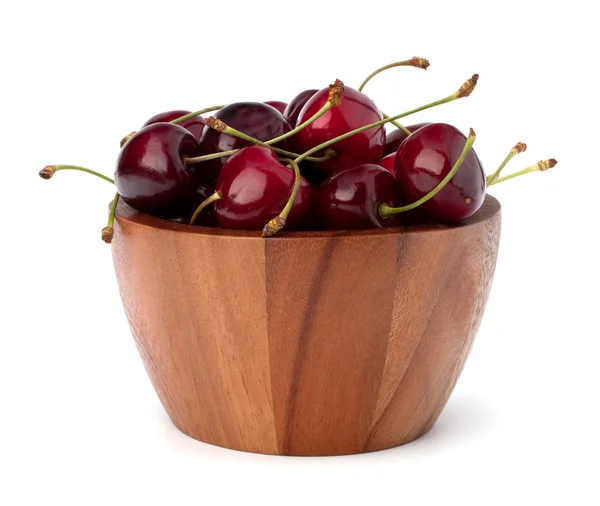Körsbär i trä skål — Stockfoto
