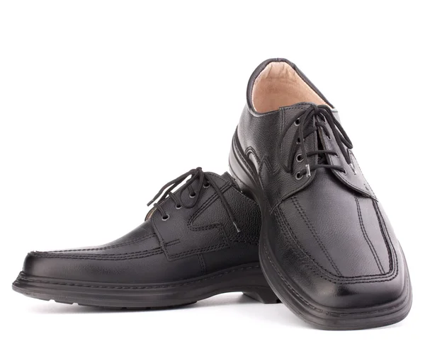 Black glossy mans shoes with shoelaces — Stock Photo, Image