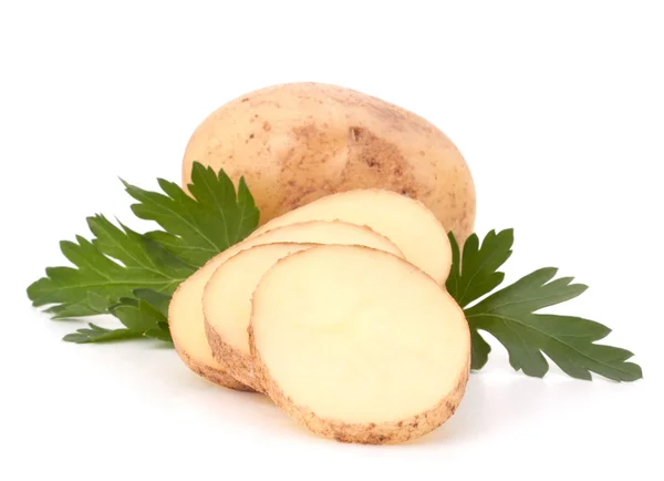 Kartoffelknollen und Petersilienblätter — Stockfoto