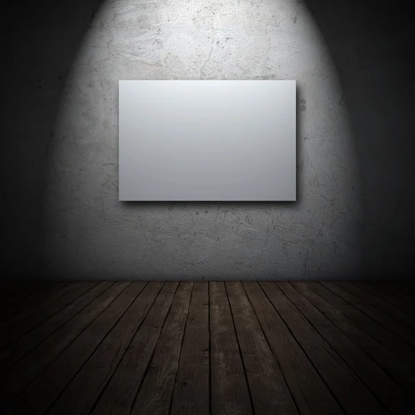 汚れた壁に白いキャンバス — ストック写真