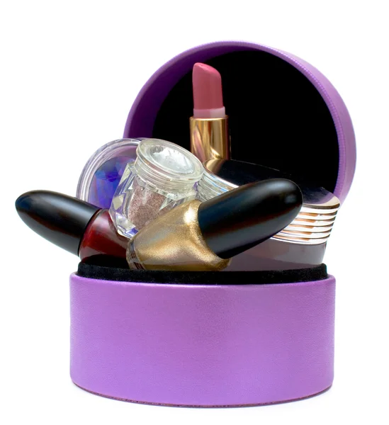 Набор косметики в фиолетовой коробке — стоковое фото