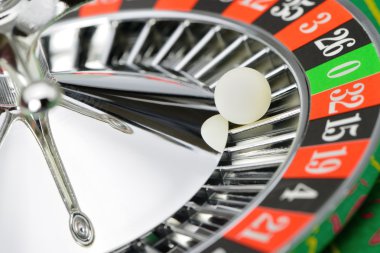 Roulette wheel in casino closeup clipart