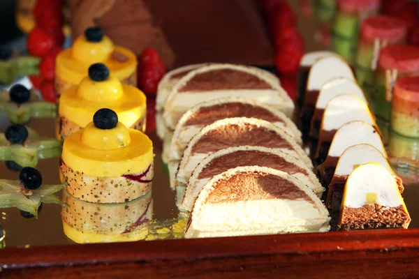 Dessert tray with decorative cakes — Stok fotoğraf