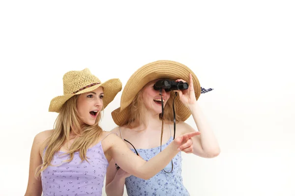 Young female tourists with binocluars — Stock Photo, Image