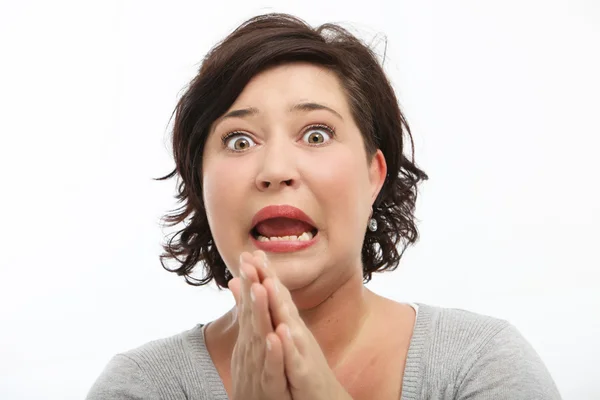 Vrouw reageren in shock en horror — Stockfoto