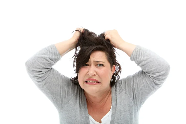Mulher estressada puxando o cabelo — Fotografia de Stock