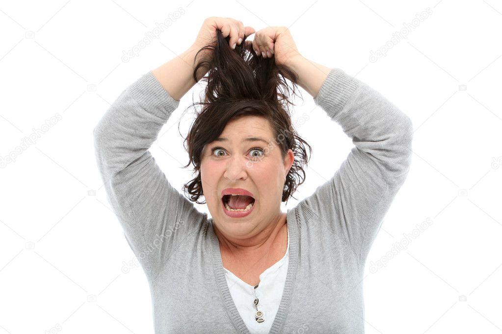 Woman tearing her hair out