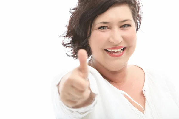 Middle-aged woman shows the cheerful thumbs up — Stock Photo, Image