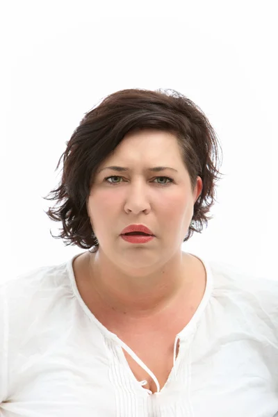 Woman looks stupid and questioning — Stock Photo, Image