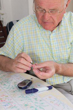 Pensioner taking blood sample clipart